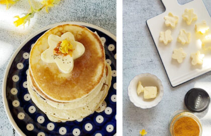 Fleurs de beurre coloré maison déposées sur des pancakes encore tièdes pour un brunch de printemps